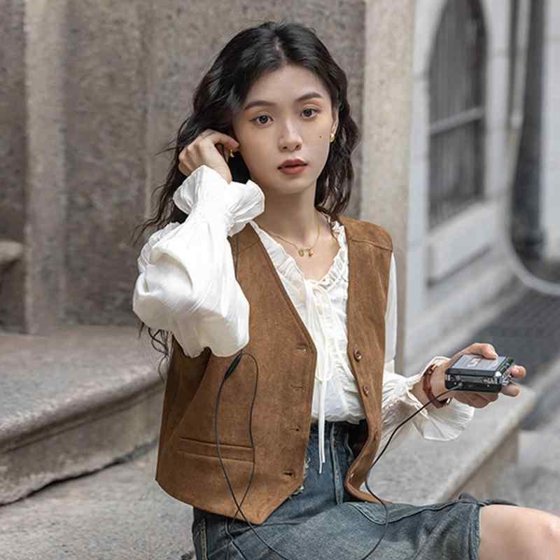 ・款式: 常规马夹・衣长: 短款(40cm<衣长≤50cm）・领型: 挂脖・图案: 纯色・流行元素: 纽扣・面料名称: 其它/涤纶（聚酯纤维）・主面料成分: 其它/涤纶（聚酯纤维）・颜色: 焦糖色・尺码: S,M,L,XL・风格类型: 气质通勤・门襟: 单排多扣・主面料成分含量: 90%（含）-95%（不含）・风格: 都市风・适用年龄段: 成人・适用性别: 女・版型: 常规・产品类别: 马甲/背心・主面料成分2含量: 90%（含）-95%（不含）・主面料成分2: 其它/涤纶（聚酯纤维）