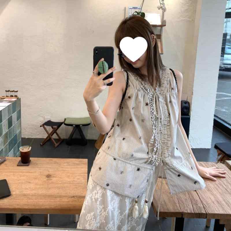 ・主な素材: 綿100%・スタイル: 通勤・ネックライン: Vネック・袖丈: ノースリーブ・柄: 刺绣条纹・サイズ展開: S、M、L