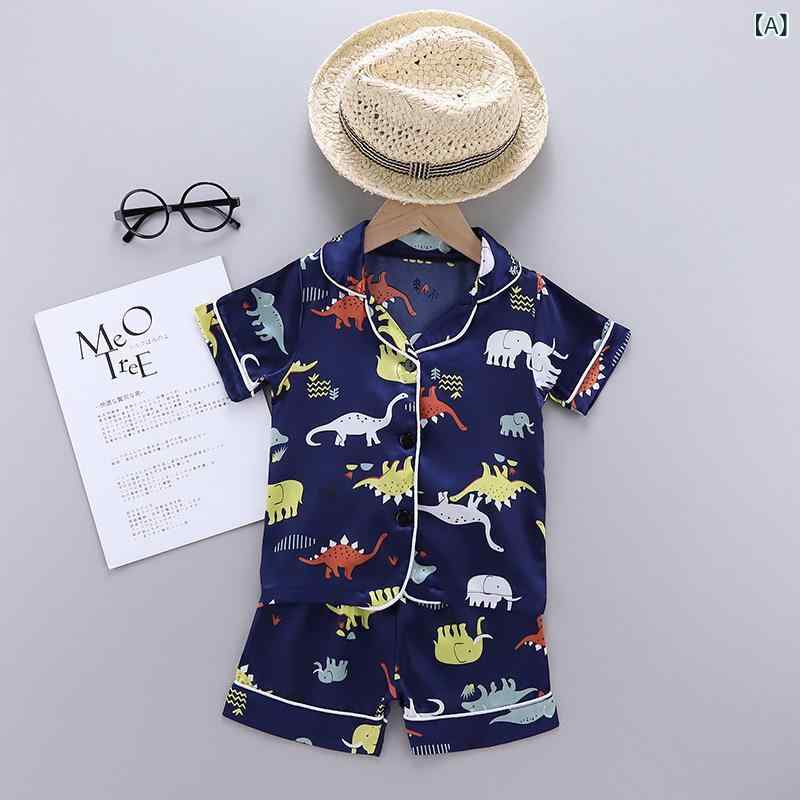 キッズ 男女共用 夏用 ホームウェア 寝間着 短袖 セット 深青 動物柄 恐龍プリント 伸縮性 薄手 柔らかい 接触冷感 ポリエステル 100% 1-6歳 80-120cm カジュアル 日常使い 室内着 かわいい セットアップ 吸湿速乾 不起毛