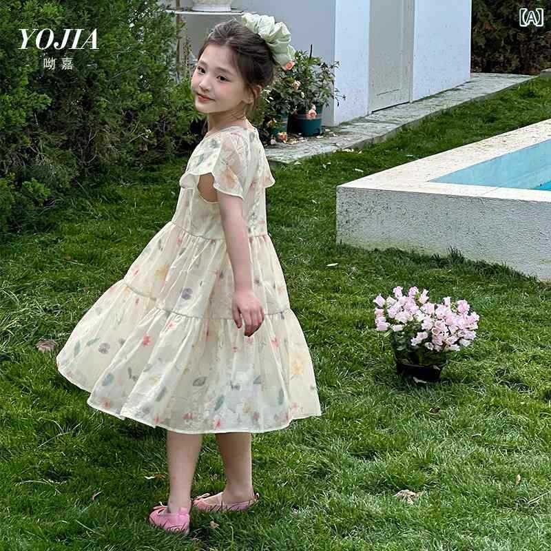 女の子 ワンピース かわいい 夏服 プリンセススカート 蓬蓬スカート フレアスカート 女児服 甘めスタイル 涤綸素材 柔らかい生地 ポリエステル 綿裏地 接触冷感 軽量 吸湿速乾 不規則ヘム 杏色 ピンク系 アイボリー 通学用 普段使い 遊び着 春夏 子