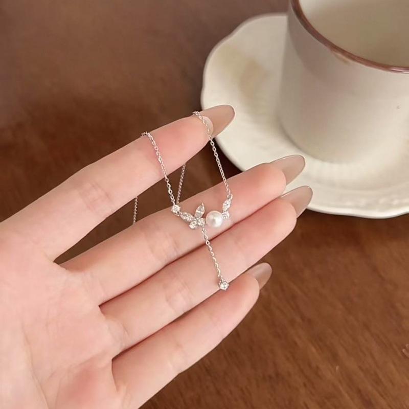 ネックレス 女性用 ファッション 通勤用 925シルバー 天然淡水パール 蝶モチーフ 流蘇デザイン 鎖骨チェーン 動物柄 シンプル 軽量 ホワイトゴールドカラー 夏向け 接触冷感加工 切り替え 動物生肖 シングルレイヤー O字チェーン 伸縮性 吸湿速乾