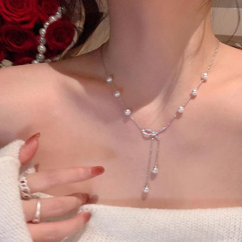 SWAROVSKI - ネックレス 女性用 蝶結 真珠 フリンジ 鎖骨チェーン かわいい 軽量 合金 電気メッキ加工 春夏 甘め デザイン 華奢 アクセサリー デコルテ チェーン シンプル フェミニン ジュエリー 華やか コーディネート ギフト
