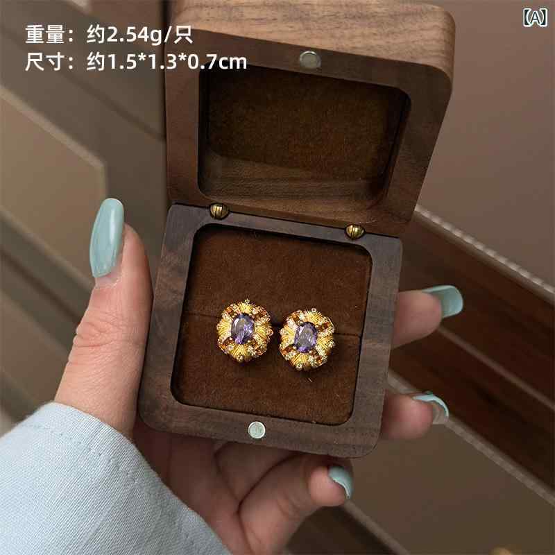 イヤリング 女性用 法式 復古 軽量 高級感 精致 気質 百搭 紫荆花 モチーフ ファッション アクセサリー 花卉 デザイン 銅素材 電気メッキ加工 春夏 コレクション 植物 モチーフ 欧米スタイル 日常使い 華やか シルバー系 カラー