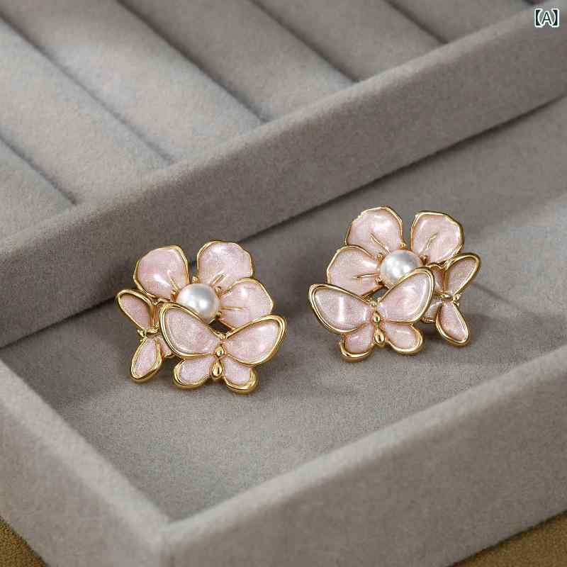 イヤリング 女性用 冬 ファッション かわいい 気品 花束 デザイン ハイセンス フレンチ スタイル 真珠 ピアス 蝶 モチーフ 接触冷感 再生繊維 ゴールド 個性 トレンド 幾何学 形状 不規則 パターン インスピレーション 風潮