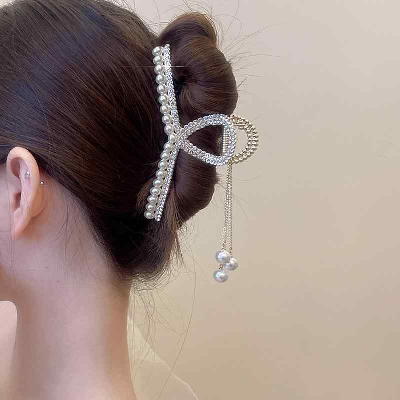 ・カテゴリ: ヘアアクセサリー・スタイル: 清新甜美・素材: 合金・加工: 手工・タイプ: 抓夹・流行要素: 珍珠・対象: 女式・カラー展開: 1_飘带珍珠+钻流苏,2_飘带珍珠流苏