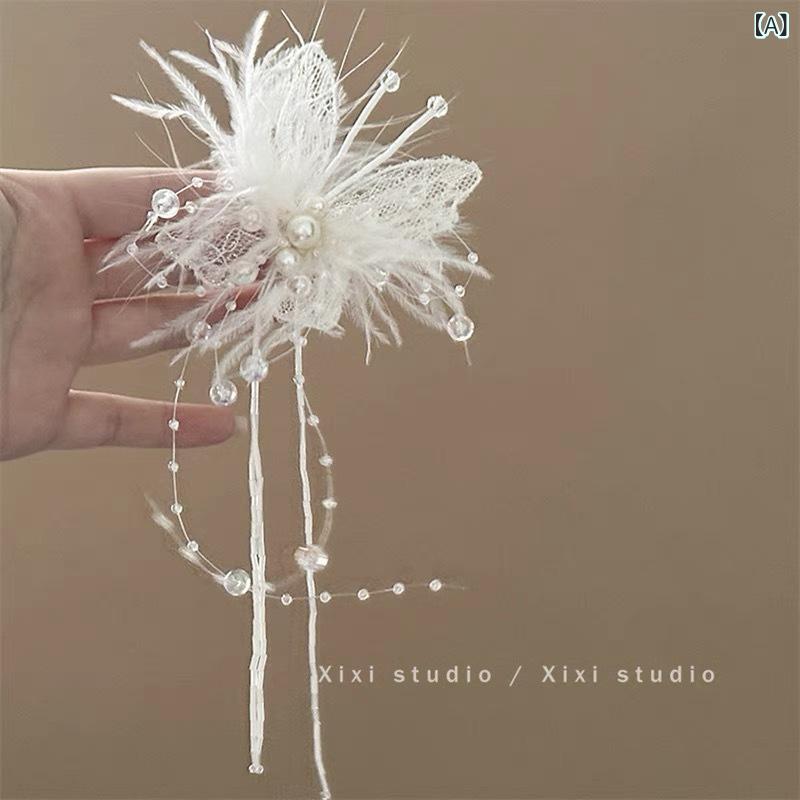 ・素材: プラスチック・加工: 手作り・種類: サイドクリップ・スタイル: 韓国風・スタイル分類: 清新で甘め・カテゴリ: ヘアアクセサリー・対象: 女性用・流行要素: フリンジ・色: ホワイトバタフライボウフリンジ・デザイン: 形状/パターン