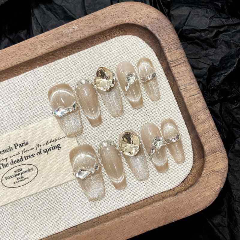 ネイルチップ フレンチスタイル 猫目デザイン スマイルモチーフ ジルコニア装飾 輝く星柄 フレンチネイル 指先おしゃれ かわいい装飾 光沢仕上げ 華やかネイル 女性用 日常使い 軽量タイプ 簡単着脱 伸縮性素材 ピンク系カラーバリエーション