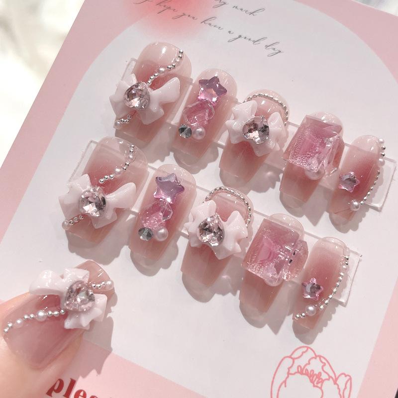 指甲貼 女性用 かわいい 少女向け 蝶結柄 着用式 ネイルステッカー 偽爪 スイート 爆闪 透明感 ピンク系 ジェルネイル 簡単装着 軽量 伸縮性 セルフネイル 日常使い ギフト向け フラワー柄 ラブリー キラキラ クリア ソフト フレキシブル 初心者対