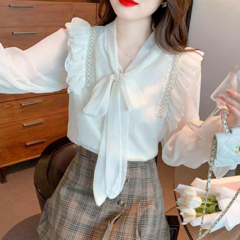 ブラウス レディース 春夏 シフォン リボン Vネック 着痩せ 清楚 かわいい きれいめ オフィス 通勤 通学 デート 普段使い おしゃれ 上品 軽量 通気性 柔らかい 快適・素材: ポリエステル、オーガニックコットン・柄: 3D効果・スタイル: 蝴蝶結款・工法: 刺繍・シルエット: ルーズフィット・着丈: 普通(50cm-65cm)・ネックライン: Vネック・袖タイプ: フリル袖・袖丈: 長袖・トレンド要素: 3D立体柄・カラー展開: 画像色・サイズ展開: S(40-47.5kg), M(47.5-52.5kg), L(52.5-57.5kg), XL(57.5-62.5kg), 2XL(62.5-70kg)・テイスト: レトロ、定番・着用方法: プルオーバー・メイン素材混用率: 30%-50%・サブ素材混用率: 30%-50%・性別: レディース