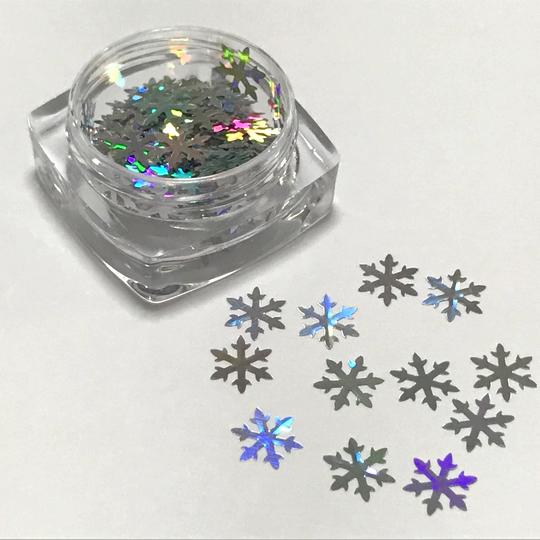 レジン封入等にオススメのクリスタルのホログラムです。 サイズ アクリルケース：30mm×30mm×15mm 1枚：7mm×8mm カラー 画像参照 素材 ホログラム 内容量 約0.5〜1g 確認事項 ※パソコンの種類や環境により、商品の色合いや質感が実物と若干異なって見える場合があります。予めご了承をお願い致します。 ※アクリルケースやガラス小瓶商品（封入素材）はスタッフが手作業で製作しているため、ケースの淵に中身がこぼれている場合があります。発送までの時間短縮のためご容赦くださいますと幸いです。