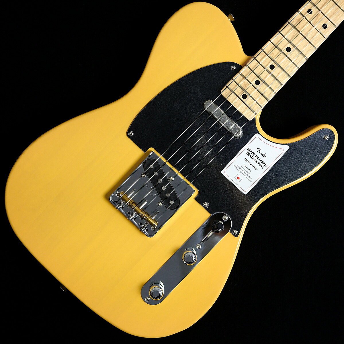 S/N JD22014580【3.12kg】Made in Japan Traditional 50s Telecaster , Maple Fingerboard, Butterscotch Blonde 【特徴】Made in Japan Traditional 50s Telecaster はグロスフィニッシュのバスウッドボディを採用。21本のヴィンテージスタイルフレットを装備した9.5インチラジアスの”U” シェイプメイプルネックがTraditionalシリーズならではのクラシカルな演奏製を提供します。3つのブラスサドル付きヴィンテージスタイルSting-Through-Bodyブリッジ、そしてTraditionalシリーズのために選定されたオリジナルピックアップはリアルで音楽的なヴィンテージトーンを奏でます。細めに設計されたナット幅は日本のプレイヤーにも弾きやすい仕様となっています。堅実なギタークラフトマンシップと、プレイヤーのニーズに柔軟に対応する答えが、本シリーズに反映されています。【商品のコンディション】新品・未展示品・メーカー保証付属・現品画像掲載こちらの個体は検品・調整後、専用倉庫にて保管しFender純正箱でお届けする安心の画像現物個体販売品です。【担当者コメント】バタースコッチブロンドと呼ばれるテレキャスターの人気カラー、ブラスサドルの効果か歯切れのよいサウンドは健在です。この商品についての詳しいお問い合わせは TEL：0570-020-025 または「お問い合わせフォーム」よりお願いします。【詳細情報】ボディBasswoodボディフィニッシュGloss PolyesterボディシェイプTelecaster ネックMapleネックフィニッシュGloss Urethaneネックシェイプ"U" Shapeスケール25.5" (648 mm)フィンガーボードMapleフィンガーボードラジアス9.5" (241 mm)フレットナンバー21Frets SizeVintageナットBoneナット幅1.615" (41.02 mm)ポジションインレイBlack DotブリッジピックアップVintage-Style Single-Coil Tele ネックピックアップVintage-Style Single-Coil Tele コントロールMaster Volume, Master Toneピックアップスイッチ3-Position Blade: Position 1. Bridge Pickup, Position 2. Bridge and Neck Pickups, Position 3. Neck PickupピックアップコンフィギュレーションSSブリッジ3-Saddle Vintage-Style Strings-Through-Body Tele with Brass Barrel SaddlesハードウェアフィニッシュNickel/ChromeチューニングマシーンChrome Die-Castピックガード3-Ply BlackコントロールノブKnurled Dome付属品：ソフトケース、保証書JANコード：0885978483242