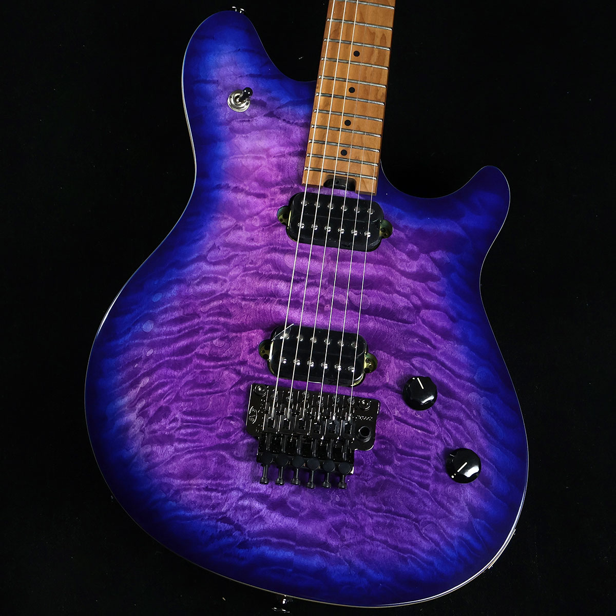 Wolfgang WG Standard QM Baked Maple Fingerboard Northern Lights S/N:ICE2302568【特徴】Wolfgang WG Standard Quilt Mapleは、エディ・ヴァン・ヘイレンが指定したスタイルと壮大なスケール感のサウンドを実現するお求めやすい価格のモデルです。よりハイグレードの上位モデルと共通の機能を多く装備し、ナチュラルなボディ・バインディングと、エレガントなキルトメイプルトップを採用したバスウッドのボディに、演奏性を最大限に高めるための特別な「コンフォートカット」コンターが施されています。ボルトオン式のベイクドメイプルネックとグラファイト強化ロッドは温度や湿度の変動に耐性があり、ネックテイルに位置するスポークホイールが迅速かつ容易なトラスロッドの調整を可能にします【商品のコンディション】新品・未展示品・メーカー保証付属・現品画像掲載こちらの個体は専任担当者による出荷前の弦交換、オイルトリートメントによる指板保湿、ネック調整後最適な弦高でお届けする安心の画像現物個体販売品です。【担当者コメント】お待たせしました！EVH ウルフガングスタンダード キルトメイプルようやく入荷しました。ネックに耐久性・音響的にも優れるといわれているベイクドメイプルを使用しトップにはキルトメイプルが使用されています。（担当：中井）この商品についての詳しいお問い合わせは TEL：0570-020-025 または「お問い合わせフォーム」よりお願いします。【詳細情報】ボディBasswoodボディフィニッシュGloss UrethaneボディシェイプWolfgang ボディトップQuilt MapleボディバインディングMasked Off Natural Body Bindingボディ素材BasswoodヘッドストックEVH Wolfgang ネックBaked MapleネックフィニッシュOiledネックシェイプWolfgang BackshapeネックBolt-On with Graphite Reinforcementネックの太さ.790" at 3rd fret & .880" at 12th fretフィンガーボードラジアス12"-16" Compound Radius (304.8 mm to 406.4 mm)FINGERBOARD MATERIALBaked MapleポジションインレイBlack Dotサイドドットフレット数22トラスロッドModern Heel AdjustトラスロッドナットHeel-Mount Truss Rod Adjustment WheelナットFloyd Rose R2 Lockingナット幅1.625" (41.3 mm)ナットの素材Floyd Rose R2 LockingブリッジピックアップDirect Mount EVH Wolfgang HumbuckingネックピックアップDirect Mount EVH Wolfgang HumbuckingピックアップコンフィギュレーションHHコントロールVolume with Treble Bleed Circuit, ToneSWITCHING3-Position Toggle: Position 1. Bridge Pickup, Position 2. Bridge and Neck Pickups, Position 3. Neck PickupブリッジEVH -Branded Floyd Rose Special Locking TremoloPICKUP COVERSBlackコントロールノブBlack Knurled with White IndicatorSWITCH TIPBlackハードウェアフィニッシュBlack ChromeチューニングマシーンEVH -BrandedSTRING TREESFloyd Rose Retainer BarTREMOLO ARMFloyd Rose Special LockingSTRAP BUTTONSOversized重量：3.17kg付属品：ソフトケース、保証書、トレモロアーム、レンチ【ご注意】●メーカー保証付き。メーカー保証期間終了後も島村楽器全店で通常よりもお安く修理、調整いたします。●この商品についての詳しいお問い合わせは TEL：0570-020-025 または「お問い合わせフォーム」よりお願いします。●こちらの商品はミ・ナーラ奈良店でのみ現物をご確認いただけます。未展示品のためご希望の方はミ・ナーラ奈良店スタッフまでお申し付けください。●売却時の商品情報の削除は迅速を心掛けておりますが、万一ご注文後に売り切れとなっておりました場合は誠に申し訳ございませんがご容赦ください。●商品によって、調整等でお届けにお時間をいただく場合がございます。予めご了承ください。■管理コード:0138000628396【kw_HRHM_EG】