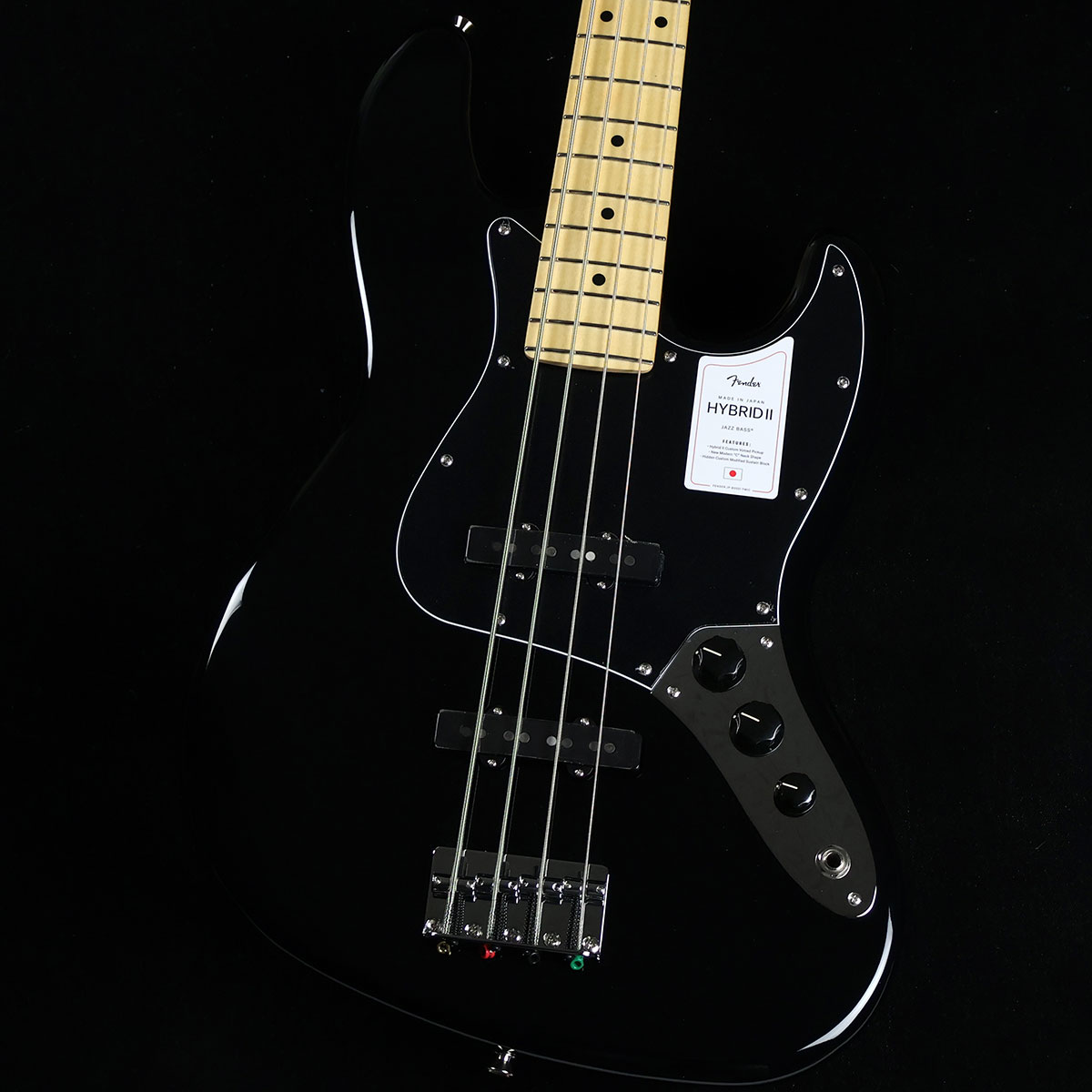 Made in Japan Hybrid II Jazz Bass Maple Fingerboard Black S/N:JD23023911【特徴】Hybrid II Jazz Bass は、定評あるアルダーボディに新設計のHybrid II Custom Voiced Single Coilピックアップを装備し、ヴィンテージスタイルのブリッジの下にはサスティンブロックを搭載。ヴィンテージスタイルチューナー、サテンフィニッシュのネック、Modern "C"シェイプに9.5インチラジアスの指板とナロートールフレットがスムーズなプレイヤビリティを提供します。より現代的な演奏スタイルに対応したハイブリッドシリーズがさらに進化しました。プレイヤーを選ばない握り込みを実現したモダンCシェイプネック、22フレット使用の採用に加え、抜けにくい構造のPure Tone Jack，キャパシターにはオレンジドロップを使用しています。ナット幅もわずかに狭くなっています。【商品のコンディション】新品・未展示品・メーカー保証付属・現品画像掲載こちらの個体は検品・調整後、専用倉庫にて保管しFender純正箱でお届けする安心の画像現物個体販売品です。【担当者コメント】2021年3月にリニューアルしたハイブリッドシリーズ。ブラックボディにブラックピックガードでメイプル指板とのコントラストが美しいモデルです。この商品についての詳しいお問い合わせは TEL：0570-020-025 または「お問い合わせフォーム」よりお願いします。【詳細情報】ボディAlderボディフィニッシュGloss PolyurethaneボディシェイプJazz Bass ブリッジ4-Saddle Vintage-StyleブリッジピックアップHybrid II Custom Voiced Single Coil Jazz Bass カラーBlackコンフィギュレーションSSコントロールノブBlack PlasticコントロールVolume 1. (Middle Pickup), Volume 2. (Bridge Pickup), Master ToneフィンガーボードMapleフィンガーボードラジアス9.5" (241 mm)フレットサイズNarrow TallハードウェアフィニッシュNickel/ChromeミドルピックアップHybrid II Custom Voiced Single Coil Jazz Bass ネックフィニッシュSatin Urethane Finish on Back, Gloss Urethane Finish on FrontネックMapleネックシェイプModern "C"フレット数21ナットの素材Boneナット幅1.5" (38.1 mm)ピックガード3-Ply BlackピックアップコンフィギュレーションSSピックアップスイッチNoneポジションインレイBlack Dotスケール34" (86.36 cm)ナットBoneチューニングマシーンVintage-Style重量：3.99kg付属品：ソフトケース、保証書、レンチ【ご注意】●メーカー保証付き。メーカー保証期間終了後も島村楽器全店で通常よりもお安く修理、調整いたします。●この商品についての詳しいお問い合わせは TEL：0570-020-025 または「お問い合わせフォーム」よりお願いします。●こちらの商品はミ・ナーラ奈良店でのみ現物をご確認いただけます。未展示品のためご希望の方はミ・ナーラ奈良店スタッフまでお申し付けください。●売却時の商品情報の削除は迅速を心掛けておりますが、万一ご注文後に売り切れとなっておりました場合は誠に申し訳ございませんがご容赦ください。●商品によって、調整等でお届けにお時間をいただく場合がございます。予めご了承ください。■管理コード:0138000629973【24Fen_sscan】