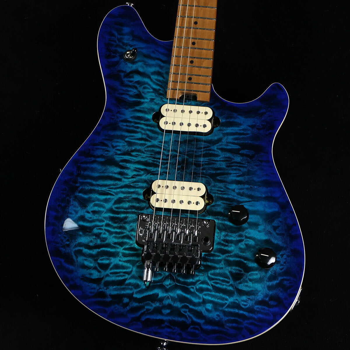 Wolfgang Special QM Baked Maple Fingerboard Chlorine Burst S/N:WG231701M【特徴】Wolfgang Special QMは、アーチドキルトメイプルトップをあしらったバスウッドボディに、グラファイトロッドで補強されたボルトオン式のクォーターソーンベイクドメイプルネックを装備し、手作業によってエディのストイックな仕様に見合ったウレタンバックフィニッシュに仕上げられています。エネルギッシュなリフとテクニカルなリードプレイに対応する12〜16インチコンパウンドラジアスのベイクドメイプル指板には22本のジャンボフレットとブラックドットのインレイが施されています。ヒールマウントされた調整ホイールにより、トラスロッド調整が簡単に行えます。【商品のコンディション】新品・未展示品・メーカー保証付属・現品画像掲載こちらの個体は専任担当者による出荷前の弦交換、オイルトリートメントによる指板保湿、ネック調整後最適な弦高でお届けする安心の画像現物個体販売品です。【担当者コメント】お待たせしました！EVH ウルフガングようやく入荷しました。こちらはキルトトップのウルフガングスペシャル。塩素を意味するクローリンバーストと名付けられたカラー、耐久性と音響特性に優れたベイクドメイプル指板仕様です。この商品についての詳しいお問い合わせは TEL：0570-020-025 または「お問い合わせフォーム」よりお願いします。【詳細情報】ボディBasswoodボディフィニッシュGloss UrethaneボディシェイプWolfgang ボディトップArched Quilt Mapleボディバインディング1-Ply Creamボディ素材BasswoodヘッドストックEVH Wolfgang ネックQuartersawn Baked MapleネックフィニッシュHand-Rubbed Satin UrethaneネックシェイプWolfgang BackshapeネックBolt-On with Graphite Reinforcementネックの太さ.805" at 3rd & .890" at 12th Fretフィンガーボードラジアス12"-16" Compound Radius (304.8 mm to 406.4 mm)フィンガーボードの素材Caramelized MapleポジションインレイBlack Dotサイドドットフレット数22トラスロッドナットHeel-Mount Truss Rod Adjustment WheelナットFloyd Rose R2 Lockingナット幅1.625" (41.3 mm)ナットの素材Floyd Rose R2 LockingブリッジピックアップDirect Mount EVH Wolfgang HumbuckingネックピックアップDirect Mount EVH Wolfgang HumbuckingピックアップコンフィギュレーションHHコントロールVolume (500K EVH Bourns Low Friction Pot) with Treble Bleed Circuit, Tone (250K EVH Bourns High Friction Pot)スウィッチ3-Position Toggle: Position 1. Bridge Pickup, Position 2. Bridge and Neck Pickups, Position 3. Neck PickupブリッジEVH -Branded Floyd Rose Locking Tremolo with EVH D-Tuna TREMOLO BLOCKBrassピックアップカバーParchmentコントロールノブBlack Plastic with White IndicatorSWITCH TIPBlackハードウェアフィニッシュChromeチューニングマシーンEVH -Branded Gotoh STRING TREESFloyd Rose Retainer BarトレモロアームFloyd Rose 1000 Series LockingストラップボタンOversized重量：3.57kg付属品：ソフトケース、保証書、トレモロアーム、レンチ【ご注意】●メーカー保証付き。メーカー保証期間終了後も島村楽器全店で通常よりもお安く修理、調整いたします。●この商品についての詳しいお問い合わせは TEL：0570-020-025 または「お問い合わせフォーム」よりお願いします。●こちらの商品はミ・ナーラ奈良店でのみ現物をご確認いただけます。未展示品のためご希望の方はミ・ナーラ奈良店スタッフまでお申し付けください。●売却時の商品情報の削除は迅速を心掛けておりますが、万一ご注文後に売り切れとなっておりました場合は誠に申し訳ございませんがご容赦ください。●商品によって、調整等でお届けにお時間をいただく場合がございます。予めご了承ください。■管理コード:0138000634410【kw_HRHM_EG】