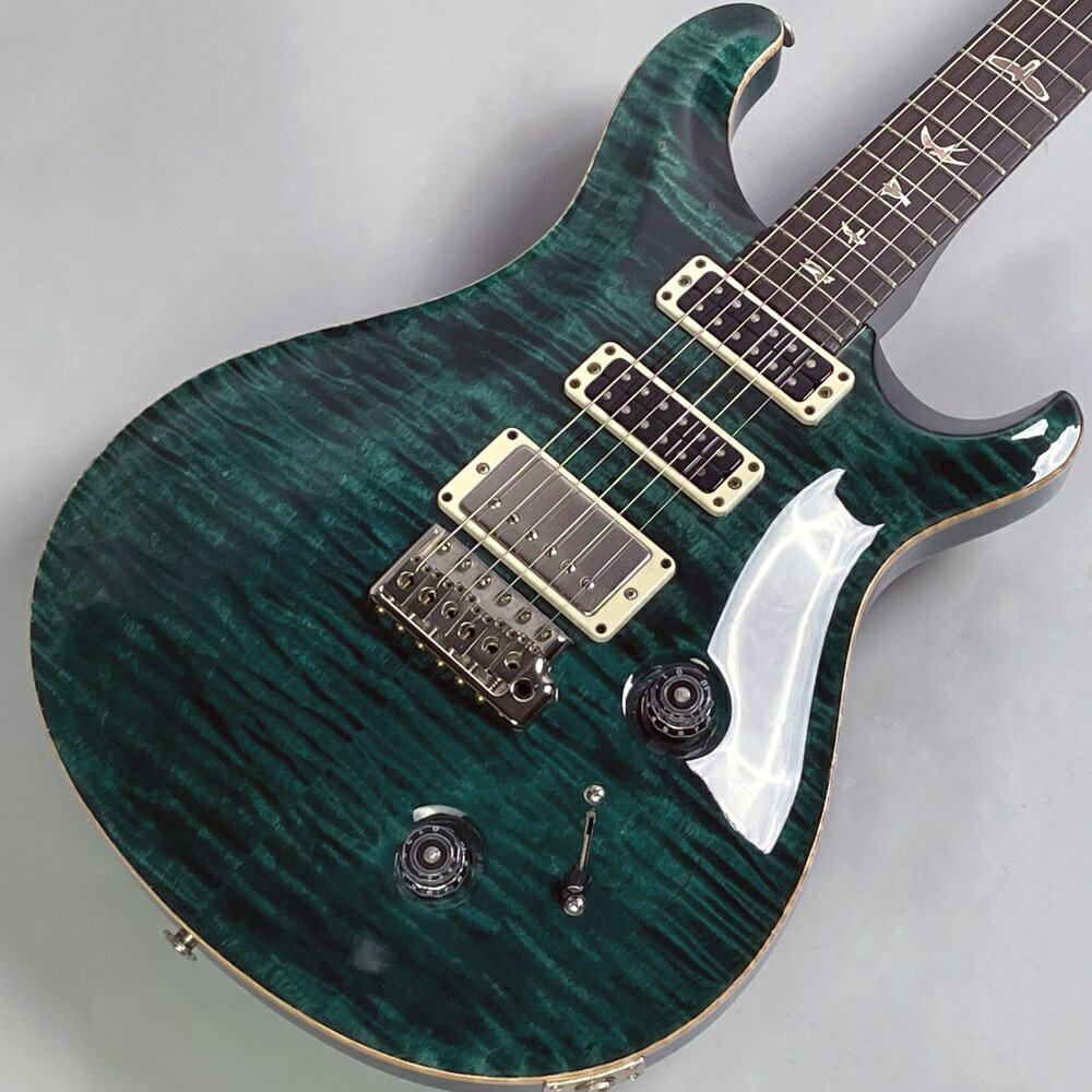 Paul Reed Smith(ポールリードスミス)/ Studio 【中古】【USED】エレクトリックギターSTタイプ【未展示品】【特徴】PRS Studio (スタジオ・モデル)は、従来のSSH (シングル・シングル・ハム)のギターの現代版です。ミドルとネック側の位置にはPRS独自のナロウフィールド・ピックアップ、そして「57/08」ハムバッキング・ブリッジ・ピックアップを搭載。パンチの効いたシングル・コイルのサウンドやヴィンテージの中音域を抑えたトーン、ブリッジ側のハンバッカーの図太いアタック音を伴う叫びのようなサウンドが、1本の楽器で得られます。今回入荷したのはテール・ブラックカラーのスタジオ・モデル「Studio Teal Black」2012年製、10本に1本の美しい杢目をもつ10Topです。ネックはPattern Thin (Wide Thin)となります。なんとペグがオリジナルから510の最高級タイプのロックペグ「SGS510-MGT」に変更されており(前の穴は埋められています)、前オーナー様のこだわりが見られます。現品画像【商品のコンディション】中古・6カ月中古保証付属・現品画像掲載ネック:極軽微な捻じれありトラスロッド:左右45度まで確認済みフレット残:70%程度外装:線キズ・側背面を中心にバックルキズ/打痕・ヘッド部ぶつけ跡ネック側面塗装 れ有り特記事項:ペグがゴトー製ペグに交換されています。重量:3.5kg2012年製ハードケース付属 【ご注意】 ●メーカー保証付き。メーカー保証期間終了後も島村楽器全店で通常よりもお安く修理、調整いたします。●商品の詳細、状態などはオンラインストア 0570-020-025 または商品画像下の「お問い合わせ」ボタンよりお問い合せください。●商品は専任スタッフ及び専属リペアマンの調整・弦交換含めたクリーニング・最終チェックをした上で出荷させていただきます。●こちらの商品は、ららぽーとTOKYO-BAY店店頭でも同時に販売しております。　●店頭売却時の商品情報の削除は迅速を心掛けておりますが、万一ご注文後に売り切れとなっておりました場合は誠に申し訳ございませんがご容赦ください。●商品によって、調整等でお届けにお時間をいただく場合がございます。予めご了承ください。 ■管理コード:0145000759258