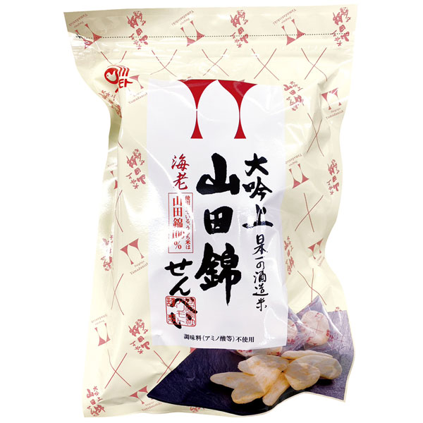 日本一の酒造米である「山田錦」の原料にこだわったやさしい味のお煎餅日本一の酒造米である「山田錦」の原料にこだわり、やさしい味のお煎餅に仕上げました。国産の海老を使用したシンプルな海老サラダ味。「山田錦」は至高の日本酒を生み出す最高の原料として、酒造メーカーから高く評価されており、中でも大吟醸酒・吟醸酒を造るには、これしかないと言われているほどです。そんな最高のお米でおせんべいを焼き上げました。お酒の味はしませんが、お米本来の味を大切にしつつ、後を引く美味しさのシンプルなサラダ味に仕上げました。「加工でん粉」や「でん粉」を使用せず、お米自身の膨張力だけでサクッとした食感を実現しています。食べやすい一口サイズ。また、一枚一枚が個包装されており、分け合いやすいことも人気です。※本製品工場では、卵・乳成分・小麦・えび・かにを含む製品を製造しています。（アレルゲン義務8品目表示を対象）商品詳細商品番号ms34011原材料うるち米（国産山田錦）、米油、干海老、塩、昆布粉末、鰹節粉栄養成分表示（100gあたり）エネルギー：458kcal、たんぱく質：6.1g、脂質：15.1g、炭水化物：74.5g、食塩相当量：1.2g内容量22枚入賞味期限製造日より150日保存方法直射日光、高温多湿の場所を避けて保存してくださいアレルギー物質（28品目）えび販売元合名会社アリモト広告文責有限会社自然館0957-22-8770【関連ワード】大吟上山田錦せんべい袋入塩,山田錦せんべい,山田錦,せんべい,煎餅,おせんべい,サラダ味,えび味,エビ味,海老味,個包装,一口サイズ,国産米,おつまみ［おかし］お菓子,おやつ［販売］合名会社アリモト