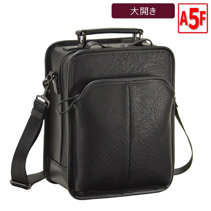 　商品内容 上質なシボ感の強い合成皮革(合皮)を使用したことで、上品さ・高級感を感じさせる魅力溢れるタウンバッグ。 A5クリアホルダーがピッタリ入るA5サイズ対応の縦型タイプ。 開口部が大開きタイプだからこそ中身が見やすく、荷物の出し入れがスムーズに。 正背面は芯材入りで型崩れを防ぎ、しっかりとした鞄に。 コンパクトなのに優れた機能性が魅力。 どの年代層でもビジネスや街持ちなどシーンを問わず活躍するタウンバッグです。 父の日、敬老の日、敬老の日、バレンタイン、クリスマス、誕生日などのプレゼントに最適。 サイズ : 横幅21cm×高さ27cm×厚み11cm 重量 : 約600g 容量 : 約6リットル 対応サイズ : A5サイズ 素材 : 合皮 カラー : 黒 生産国 : 中国製 正面 : ファスナーアウトポケット 本体内部 : ファスナーポケット、アテポケット その他 : 天取っ手、ショルダーベルト
