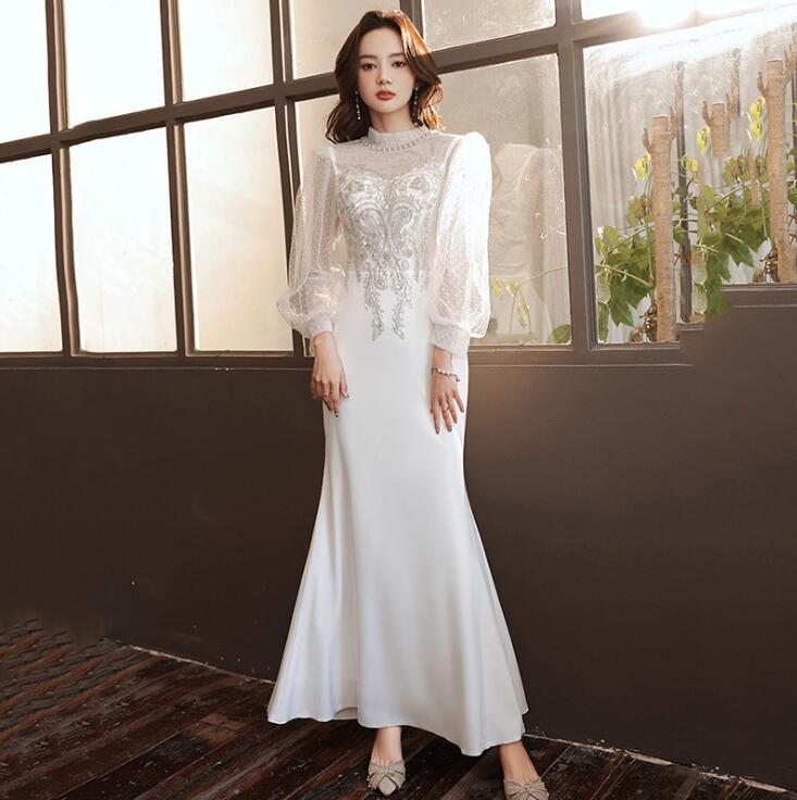 【送料無料】パーティードレス マーメイドドレス バルーンスリーブ ビーズ付き 高級感 シースルー袖 白ワンピース ファスナー 演奏会 撮影 ビーチフォト 司会 舞台衣装 きれいめ エレガント 結婚式 披露宴 同窓会 二次会 お呼ばれ 発表会 ピアノ 旅行 礼服 ママ 母親