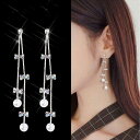 ピアス スイング フリンジ 揺れる 華奢 リボン パール アクセサリー メタル 上品 ロング ギフト 普段使い