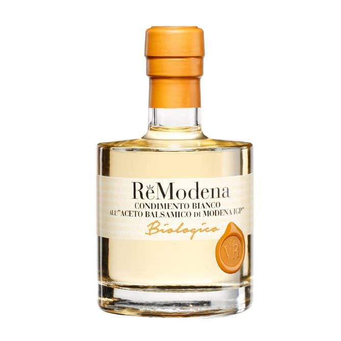 レモデナはバルサミコの生産地として世界的に有名なイタリアのエミリア・ロマーニャ州、モデナにあります。 ぶどう品種であるランブルスコとトレッビアーノを自社農園にて育て、着色料や増粘剤を一切使わずに、代々家族に受け継がれた伝統的な方法で製品を製造しています。 また、イタリア国内でHACCP、IGP（地理的表示保護）、EUROPEAN　BIO（EU規定有機食品認証）、有機JAS（日本規定有機食品認証）等様々な認証を取得しており、製品の品質と安全に自信を持っています。オーガニック白ワインビネガーと オーガニックぶどう果汁をオーク樽にて熟成させています。繊細な優しい酸味とエレガントな甘みを持つ、オーガニックのホワイトバルサミコ酢です。口当たりが良く、フルーティですっきりとした爽やかな味わいで、幅広い食材にご使用頂けます。オリーブオイルと合わせてドレッシングの代用としても美味しく召し上がれます。どんなレシピでもこの一本で味が決まる、オススメのホワイトバルサミコ酢です。ReModenaイエローラベルは、グレープマストとトレッビアーノグレープビネガーを組み合わせたクラシックな白いドレッシングです。オーク樽で熟成させると、より調和のとれたバランスの取れたストラクチャーになります。酸性度が低いため、繊細で攻撃的ではなく、強さと輝きのヒントがあり、サラダからビネグレットソース、魚からマリネまで、幅広い用途に最適です。鮮やかでクリアな麦わら色で、強烈で心地よい香りがします。決定的だが攻撃的ではないフレーバーで、軽くて心地よい甘いノートで終わります。【材料】 濃縮有機ブドウマスト、有機白ワインビネガー。【推奨される組み合わせ】 夏のサルサド、魚、ビネグレット、生野菜、焼き野菜、マリネ、カルパッチョ 有機栽培で作られ製造されている白いお酢ですので、お水やソーダで割ってドリンクとして飲んで頂くのもオススメです！名称：有機ぶどう酢内容量： 100ml原材料： 有機ぶどう果汁、有機ワインビネガー※パッケージデザインが予告なく変更になる場合が御座いますので予めご了承ください。商品の品質は変わりませんのでご安心ください。 ドレッシング作りで、一番困るのが酸味。 レモンやワインビネガーだけだと酸味が尖りすぎるし砂糖や蜂蜜を足すのも何かが違う気がする。 オリーブオイルとシャカシャカ振って乳化を頑張ってもやっぱり味に丸みが足りない！ そんな時はこのホワイトバルサミコ酢！ 葡萄の甘みがたっぷり入っているから味に丸みがあり、使いやすいんです。 ホワイトワインビネガーと一緒に熟成されているから酸味も丁度いい感じで感じられます。 酢の物にもカルパッチョにも使えちゃう万能なお酢です！ 一本あれば多用してしまう事間違いなし！