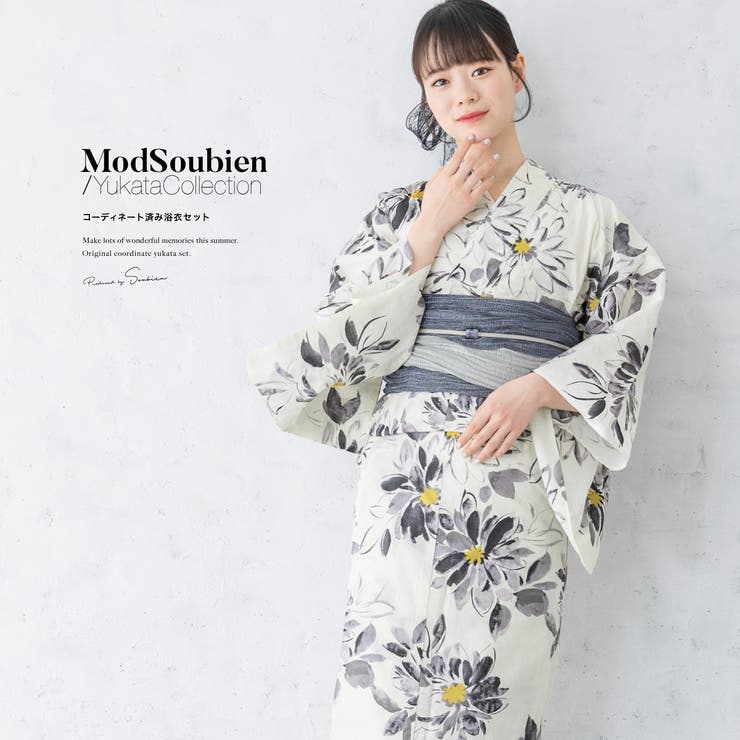 新作コーデ！夏を彩るレディース浴衣セット新作コーデ！夏を彩るレディース浴衣セットです。 内容は【浴衣・帯・下駄】の3点セットです。 浴衣生地は、柔らかい肌触りと吸湿性に優れた綿100％です。帯は化繊素材です。 仕立て上がりですので、お届け後すぐにお召しいただけます。商品詳細■色浴衣　クリーム地に深紫系帯　紺×薄灰■素材浴衣：綿100%帯：ポリエステル64%、ナイロン35%、ポリウレタン1%■下駄素材鼻緒：ポリエステル台：桐■内容浴衣・帯・下駄注意事項こちらの商品は、浴衣・帯・下駄の3点セットです。セット内容の一部変更や、それに伴う値引きは承っておりません。商品入荷の都合により、帯の艶感や地模様が画像と異なる場合がございます。帯は作り帯ではございません。撮影環境により、モデル着用の商品が実際の色よりも明るく見える場合があります。商品の色みは単品で撮影された画像をご参照ください。涼しさを保つため、生地は適度に薄く透け感があります。※セットの下駄は、当店選別の「おまかせコーデ」です。台色や鼻緒の色柄のご希望は承りかねますのでご了承ください。サイズ表?身丈袖丈裄丈フリー約163cm約49cm約67cm?幅長さ兵児帯約37cm約400cm?幅長さ高さ適応サイズ下駄約8cm約24cm約3.5cm23.0〜24.5cm返品・交換について購入後の交換は受け付けておりません。予めご了承ください。返品を希望される場合は購入履歴一覧の「ショップへの問い合わせ」よりお問い合わせください。=========================複数配送先指定について1件の注文に対して、異なる住所への配送は対応出来かねます。恐れ入りますが、異なる住所へ配送をご希望の場合、配送先毎に分けて注文いただきますようお願い申し上げます。【浴衣・着物WOMEN】フリー クリーム地に深紫系×紺×薄灰