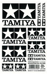 TAMIYA タミヤ ロゴステッカー モノクロ ●タミヤロゴと星マークを落ちついたブラックで仕上げたステッカーです。 モノクロはホワイトがベース、透明は下地が透けるタイプ。 どちらもツヤありのラミネート加工を施しました。 ●さらに、ゴールドとシルバーはホイル紙を使用した輝きのあるメタリック調が特徴。 どれも11枚構成で、ステッカーは各サイズともカット加工済みです。 ●台紙サイズ約180mm×115mm　 ※掲載画像は実物と若干色の感じが異なる場合があります。 【JANコード】4950344672585 【状態】新品 【発送】1〜2営業日で発送（休業日除く）