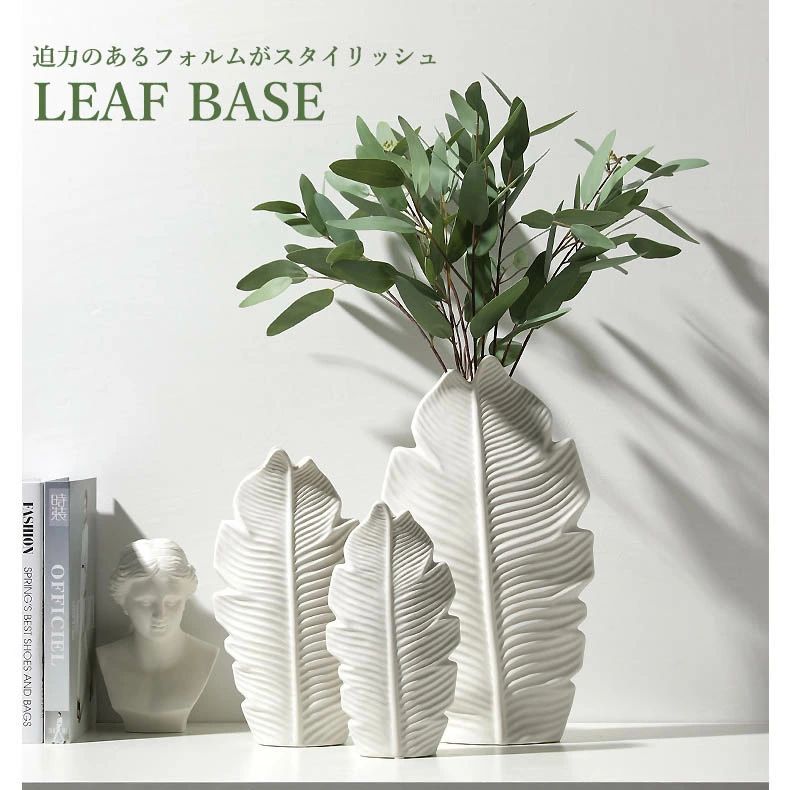 商品詳細 商品説明 ※ドライフラワー専用の花瓶です。予めご了承ください。 ・バナナリーフを猫モチーフにしたお洒落な花瓶です。 ・迫力のあるフォルムがスタイリッシュでトレンドのインテリアが叶えます。 ・ドライフラワーを飾ったり、そのままオブジェとして飾って頂けます。 ・店舗用ディスプレイやお部屋の雰囲気作りに最適、ギフトにもおすすめです。 ※入荷時期によって、若干の違いがございます。ご了承のうえご注文くださいませ。 サイズ 画像に記載 材質 セラミックス 色 画像に記載 ※ 注意事項：モニターの発色により、実物と異なる場合がございます。 注意事項 ※海外輸入品のため、商品の細部仕様は予告なく変更になる場合がございます。交換/返品対象外になりますので、ご了承下さい。 ※本製品を使用することにより発生した損傷、破損、損害、事故等に関して弊社では責任を負いかねます。ご了承下さい。 ※採寸方法違いより、多少の誤差がございますので、ご了承ください。 ※海外輸入品のため、商品の細部仕様は予告なく変更になる場合がございます。交換/返品対象外になりますので、ご了承下さい。 ※手作業で仕上げており、仕上がりに個体差がありますが、ご了承の上お買い求めください。注意事項：モニターの発色により、実物と異なる場合がございます。 商品詳細 商品説明 ※ドライフラワー専用の花瓶です。予めご了承ください。 ・バナナリーフを猫モチーフにしたお洒落な花瓶です。 ・迫力のあるフォルムがスタイリッシュでトレンドのインテリアが叶えます。 ・ドライフラワーを飾ったり、そのままオブジェとして飾って頂けます。 ・店舗用ディスプレイやお部屋の雰囲気作りに最適、ギフトにもおすすめです。 ※入荷時期によって、若干の違いがございます。ご了承のうえご注文くださいませ。 サイズ 画像に記載 材質 セラミックス 色 画像に記載 ※ 注意事項：モニターの発色により、実物と異なる場合がございます。 注意事項 ※海外輸入品のため、商品の細部仕様は予告なく変更になる場合がございます。交換/返品対象外になりますので、ご了承下さい。 ※本製品を使用することにより発生した損傷、破損、損害、事故等に関して弊社では責任を負いかねます。ご了承下さい。 ※採寸方法違いより、多少の誤差がございますので、ご了承ください。 ※海外輸入品のため、商品の細部仕様は予告なく変更になる場合がございます。交換/返品対象外になりますので、ご了承下さい。 ※手作業で仕上げており、仕上がりに個体差がありますが、ご了承の上お買い求めください。