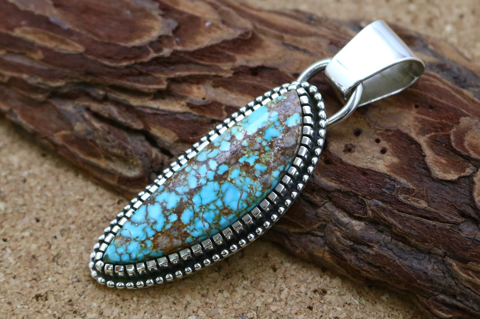 インディアンジュエリー ナバホ族 Landon Secatero (ランドン・セカテロ) 作 ナンバーエイト ターコイズ ペンダントトップ ネイティブ アメリカ...