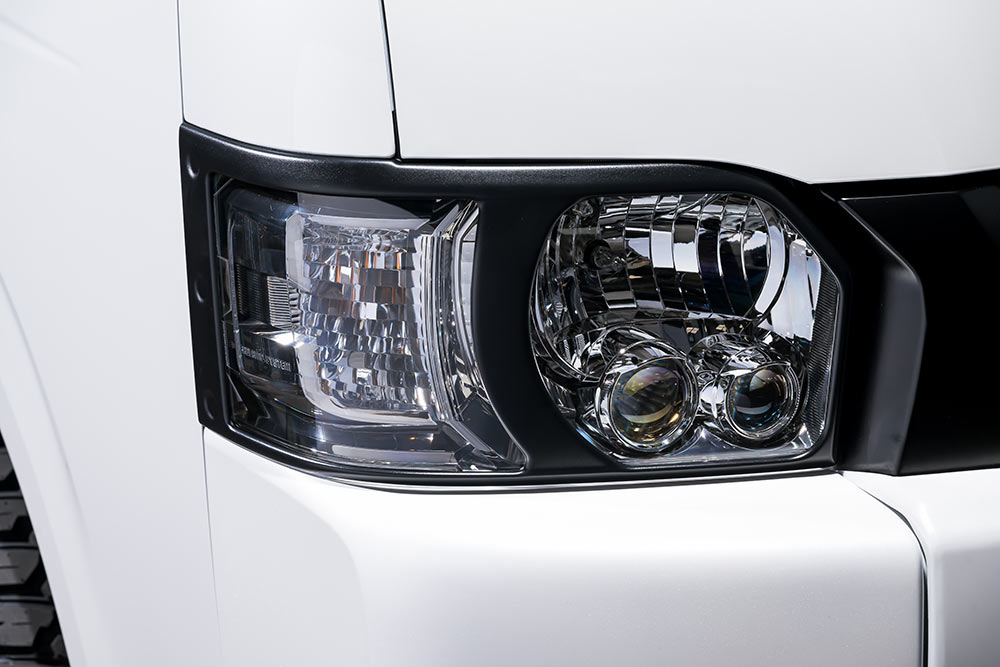 エムズスピード ハイエース GDH211K/TRH211K ヘッドライトガーニッシュ シボ加工のつや消しブラック仕..