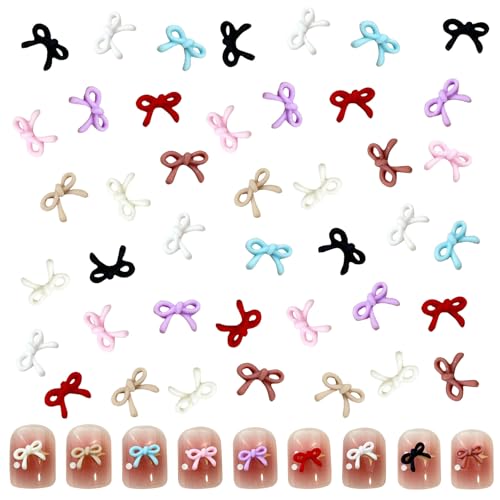 ネイルパーツ リボン 約100個セット 3D 立体 リボン ネイルパーツ ストーン 可愛い 小さい 蝶結び ネイルアート リボン デコパーツ ハンドメイド レジン用 ランダム色のサムネイル