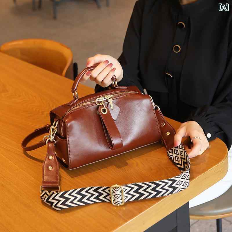 牛革の 斜め 掛けの カバンの 女性 2024の 新型の 女性の カバンの 高級な 質感の ボストンピローバッグの 手提げの片 肩の 小さい 方の カバン(x3)