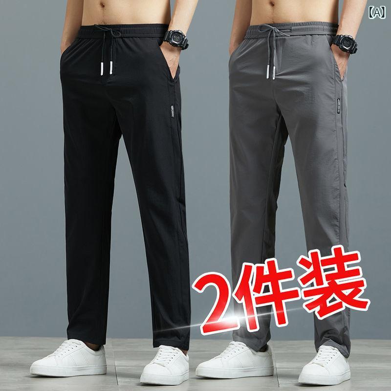 乐天商城 - 仕事を して いる ズボンの 男性は 出勤 して ゆったり した 仕事の ズボンを 着て います。