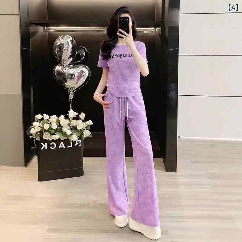 ヨーロッパ スタイルの ファッショナブルで ハイエンドの 女性 用 カジュアル スポーツ スーツ、 夏 スタイル、 年齢を 軽減 する 半袖..