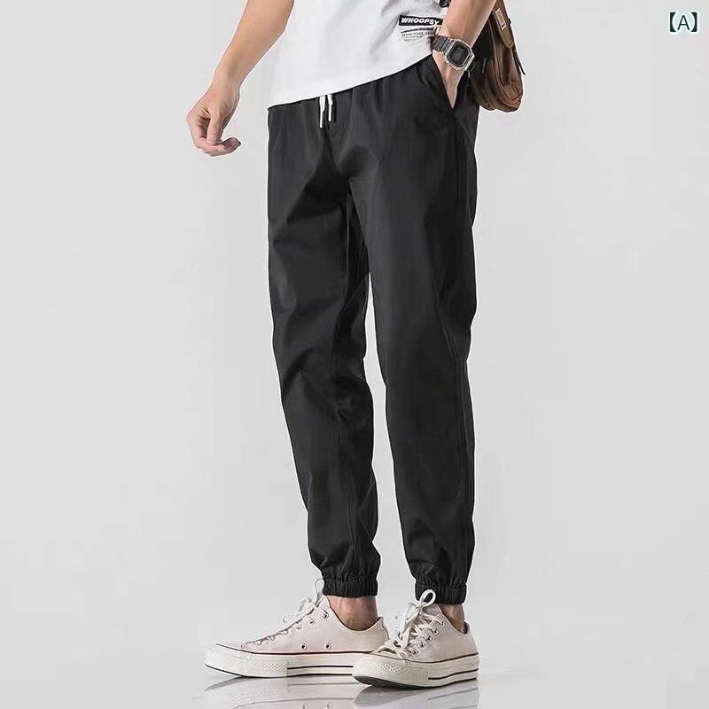 Rakuten - 夏の ズボンの 男性の 韓国 版の ファッションの 男子 学生の 足首の ズボンの ハーレムの ズボンの ゆったり して いる 足は 9 分の 運動の カジュアルな ズボンを 合わせます。