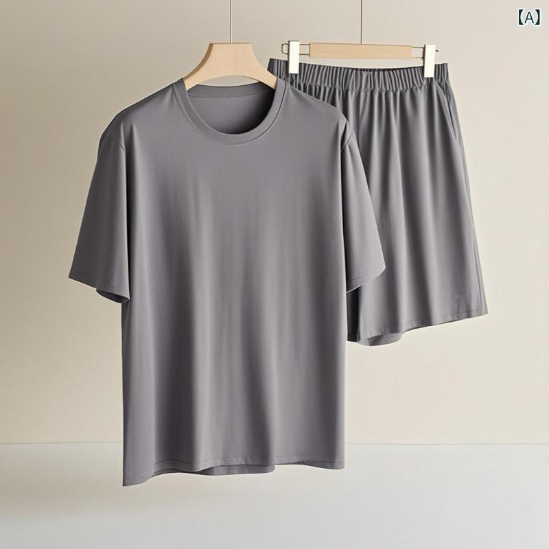 新しい 夏の ミントの 涼し さの パジャマの 男性の 半袖の半 ズボンの ゆったり して いる 薄い タイ..