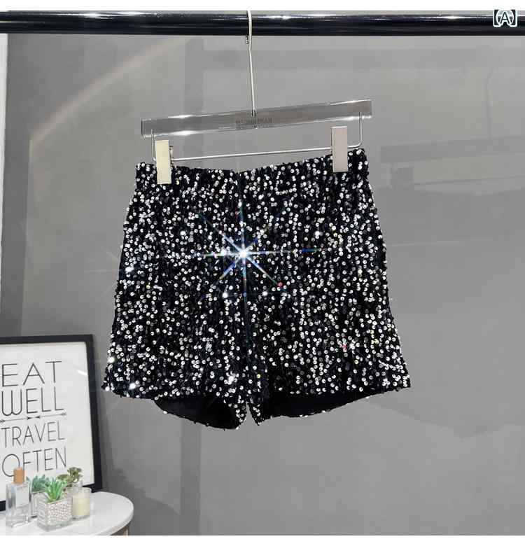 欧米 風の スパンコールは ポケットの 黒い半 ズボンが あります。