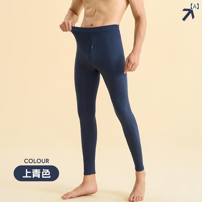 秋冬の 男性の 女性の 内は 跡の ない 膝の 保温の ズボンを 着て います。