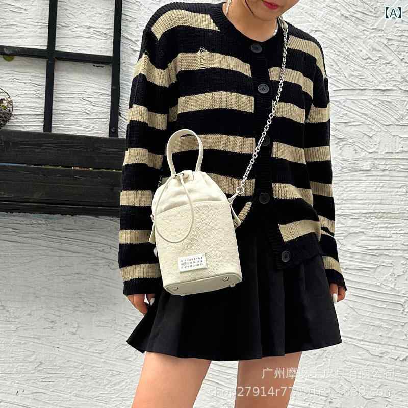 春の 新型の本 革の 潮流の 小さい 大衆の軽 豪華な 手提げの 斜め 掛けの 女性の 百 合は 縄の バケツの 包みを 引き出します。
