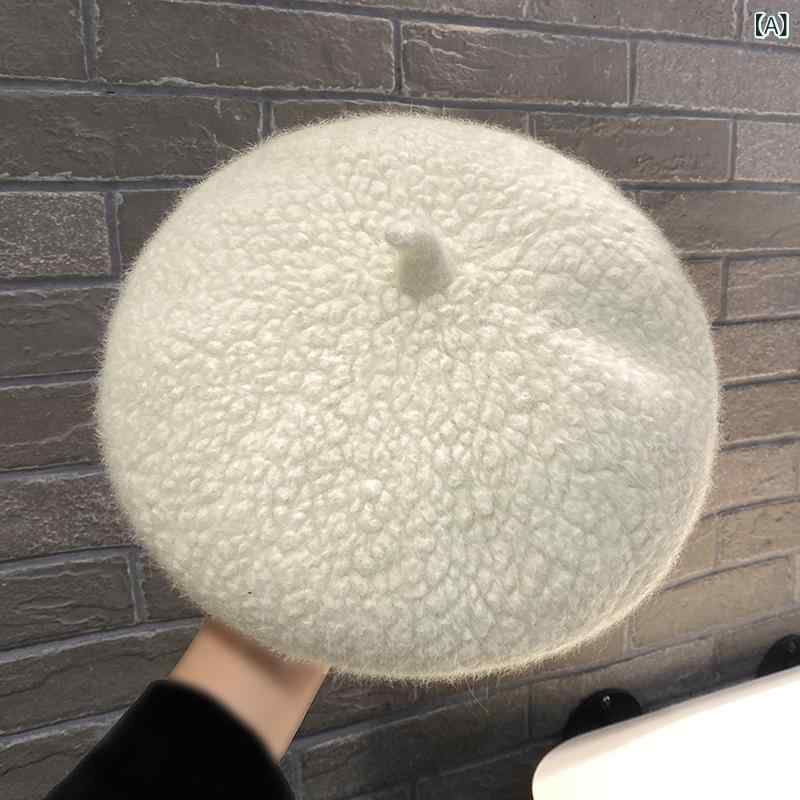 ウサギの 毛の ベレーの 帽子の 子供の 秋冬の 大きい 粒の 毛の 絨毛の 画家の 帽子は だらだら して います。