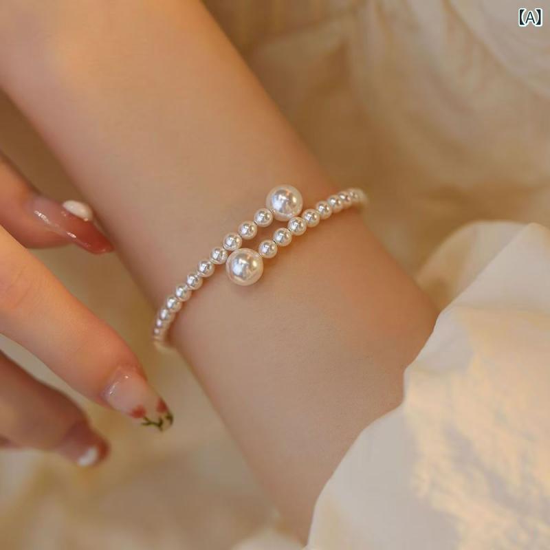 Bracelets - ガラスパールブレスレットニッチデザインライト 高級 ファッションハンドジュエリー 気質 弾性 調整 可能な 模造 真珠 ブレスレット 卸売