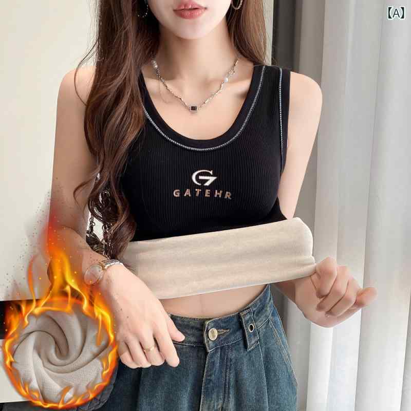 ベルベットの 胸 付き スト ラップ 付き 保温 ベスト 女性は、 新しい 冬の 修身を 厚く して、 袖の ない 弾力 的な 上着の シャツを 着て います