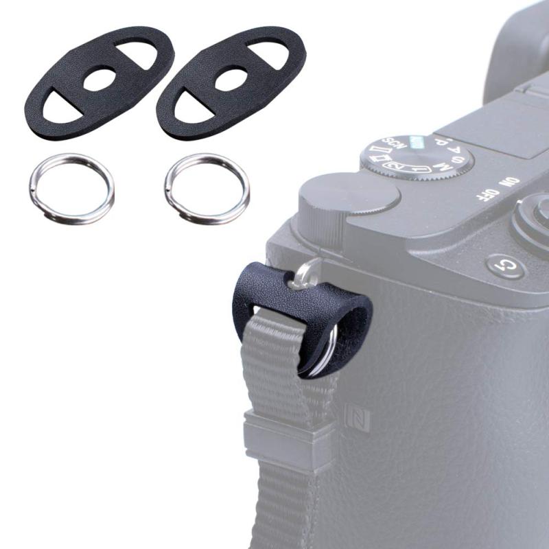 VKO 丸リング リングカバー 丸リングフックと保護パッド システムコネクター ストラップアダプター 2個セット ブラック【材質】ステンレス鋼製の丸リングと高品質の手作りの保護パッド、丈夫で、カメラのキズを防ぎ、カメラを保護します。【仕様】丸リング：外径：1.5CM，内径：1.3CM，線径（厚さ）：2.4mm。保護パッド：長さ：3.4CM，幅：2.2CM，中央の丸型穴の直径：7mm，両側の穴の幅のサイズ：12mm。（誤差±0.5mm）最大幅約12mmのカメラベルトに最適。保護パッドは 弾性があり、ストラップの幅は少し広げることができます。（購入前にカメラベルトの幅を確認してください）【互換性】丸型の小さいリングリングを持つすべてのブランドのカメラに適しています。幅広のカメラストラップをカメラの穴に接続するときに使用します。【パッケージ内容】PU保護パッド2個と丸リング2個が含まれています。【取付の点】取り付けが簡単、写真紹介を参考にしてください。