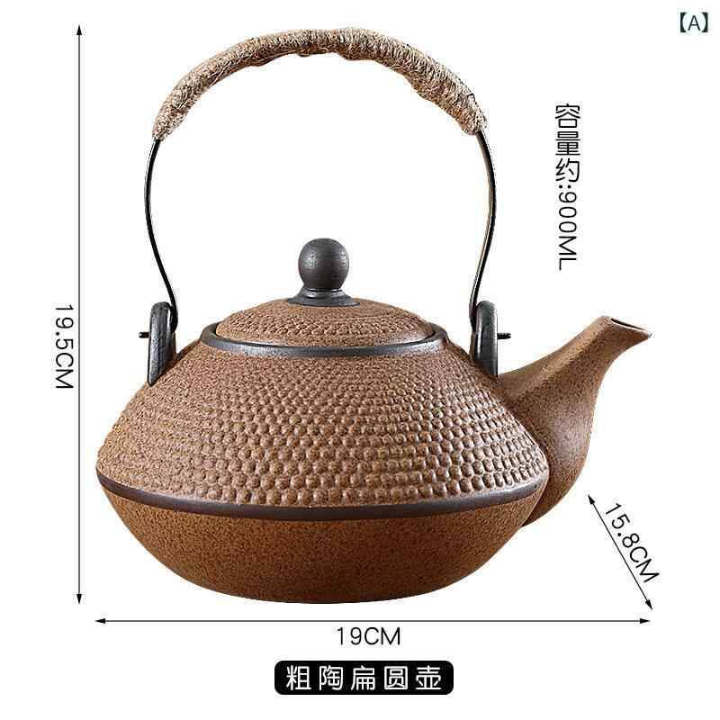 純粋な 陶 急須は 梁 壺の 陶磁器の 湯たんぽを 提げます。