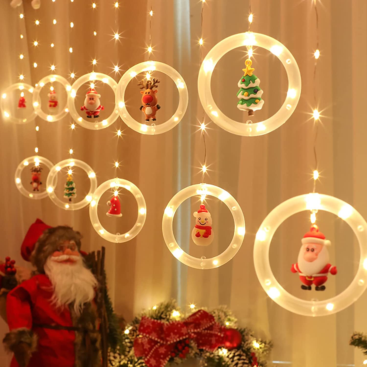 【クリスマス雰囲気溢れる】可愛くて、クリスマス雰囲気が溢れます。暖かい白色LEDリングは素晴らしい照明効果と暖かい雰囲気を作り出し、ロマンチックな雰囲気を加えます。常亮LEDしながら点滅LED付き点灯モードで、夜景でウォームホワイトなライトカラーは柔らかくて美しい、キラキラなライトを飾ると、夢幻的な雰囲気もアップしています。 【USB充電式&amp;省エネルギー】USBインターフェースは頻繁な交換やバッテリー購入の煩わしさを排除し、非常に安全な5Vの低電圧で動作します。コンピューター、USBアダプター、モバイル電源など、USBインターフェースを備えたあらゆる機器に接続できます。光線は健康で、紫外線や赤外線を含まないので、汚染なしで目を保護します。暖かくてロマンチックで環境に優しい省エネ製品です 【高品質&amp;取付簡単】スターライトは低圧だけでなく、防水もあります。安心して使えます。主線にホックがついていますので、壁に引っ掛けることの出来るフックを用意して吊り下げるだけです。当電飾の設置には時間を要しません。防水ですが、雨や雪の日にも利用できます。長い使用寿命を保つために、水の中にそれを使用しないでください。 【適用場合】天井から吊るしてもよし、壁に貼ってもよし、床に並べてもいいです！色合いのセンスがよくて、普段お部屋や店などの飾りに活用します。誕生日、パーティー、婚礼式、クリスマスもしくはその記念日、祝日、イベントなどの飾り付けに適用します。 【素材】：長さは3mのメートルであり、10個0.5m電球リボン、直径10 cmリングを持っています。頑丈な銅線を採用して、銅線の部分は曲がったり折ったりしても変形と崩壊はしません。10個ミニサンタ電球並べても可愛い、クリスマスのデコレーションとして手軽に飾ったり、置いたりできます。USBケーブルを使って充電します（データ線は含まれていません）