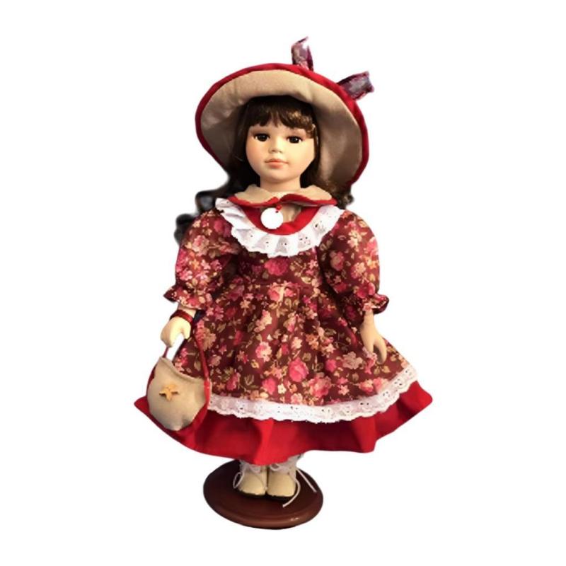 花柄の服とディスプレイの装飾が施された30cmの素敵な磁器の女の子人形