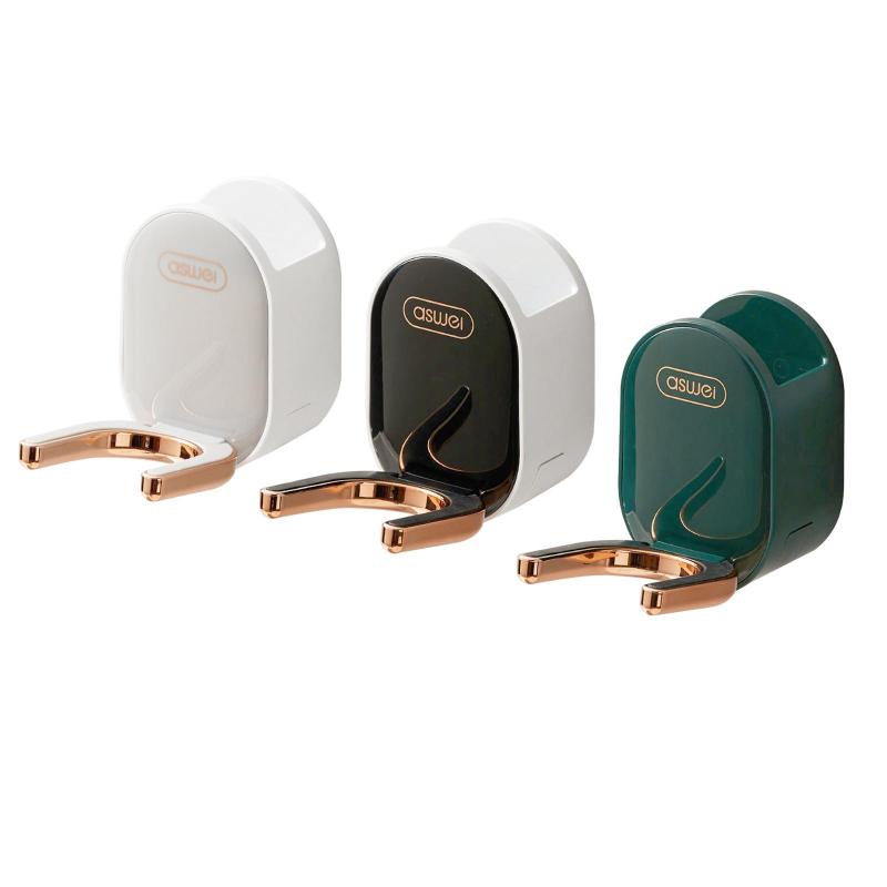 シャワールームのキッチン収納用に壁に取り付けられた折りたたみ式ヘアドライヤーホルダー