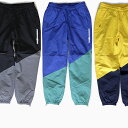 ザハンドレッズ THE HUNDREDS トラックパンツ 撥水 ANGLES TRACKPANTS T19P104021ブラック ブルー イエロー ロゴ カラー 切替 ズボン ボトムス パンツ プレゼント