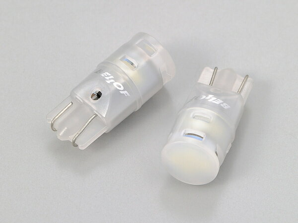 【カラー】 ホワイト 【サイズ】 Φ9.75×24mm ポジション付ヘッドライト車にフォース・レイ(廃番)/プレシャス・レイを装着した際に起きる、 色温度の違いを解消する6500Kのウェッジバルブ。 T10規格同寸法のサイズにLEDを多数配置し、ハロゲンバルブ同等の約270度照射。 2個セット。車検対応。T10バルブ対応。 ●高輝度LED素子×8個 ●150ルーメン 6500K ●定電流回路内蔵 注意事項 ※ヘッドライトのポジション用です。ライセンスランプ(ナンバー灯)用としての試験は行なっておりません。 ※色温度は完全に一致しない場合があります。