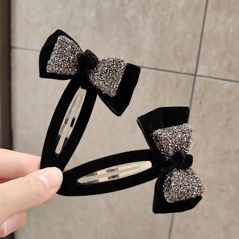 ヘアクリップ レディース 黒 リボン ラインストーン 立体 布製 シンプル 高級感 輝き 韓国風 かわいい ヘアアクセサリー サイド ピン 普段使い ヘアアレンジ