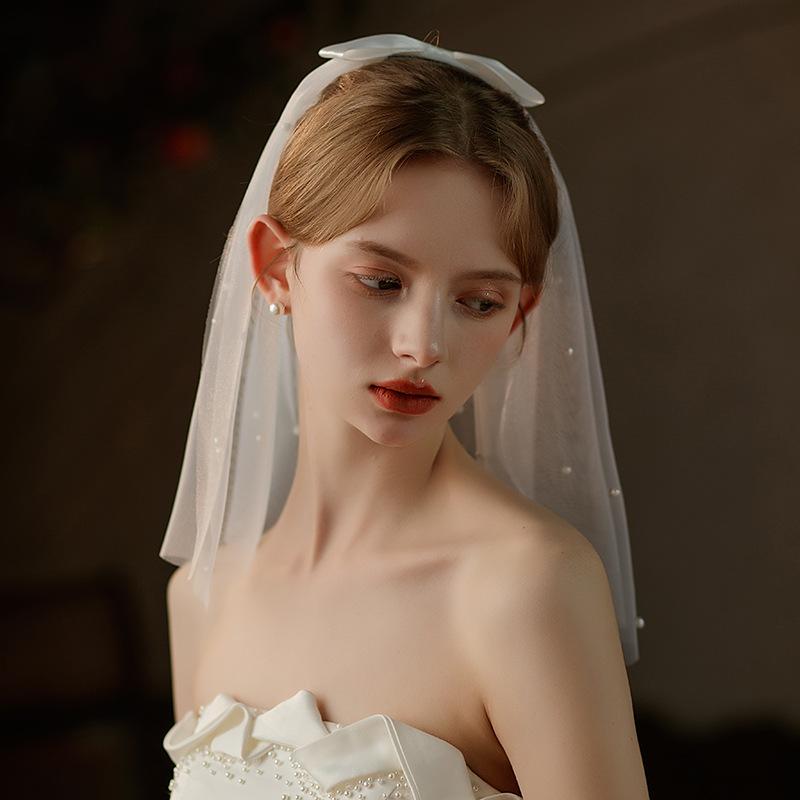・カテゴリ: ヘアコーム・スタイル: レトロ・素材: ナイロン・性別: 女性・デザイン: 蝶結び・構造: 二層式・カラー: アイボリー・装飾: パール